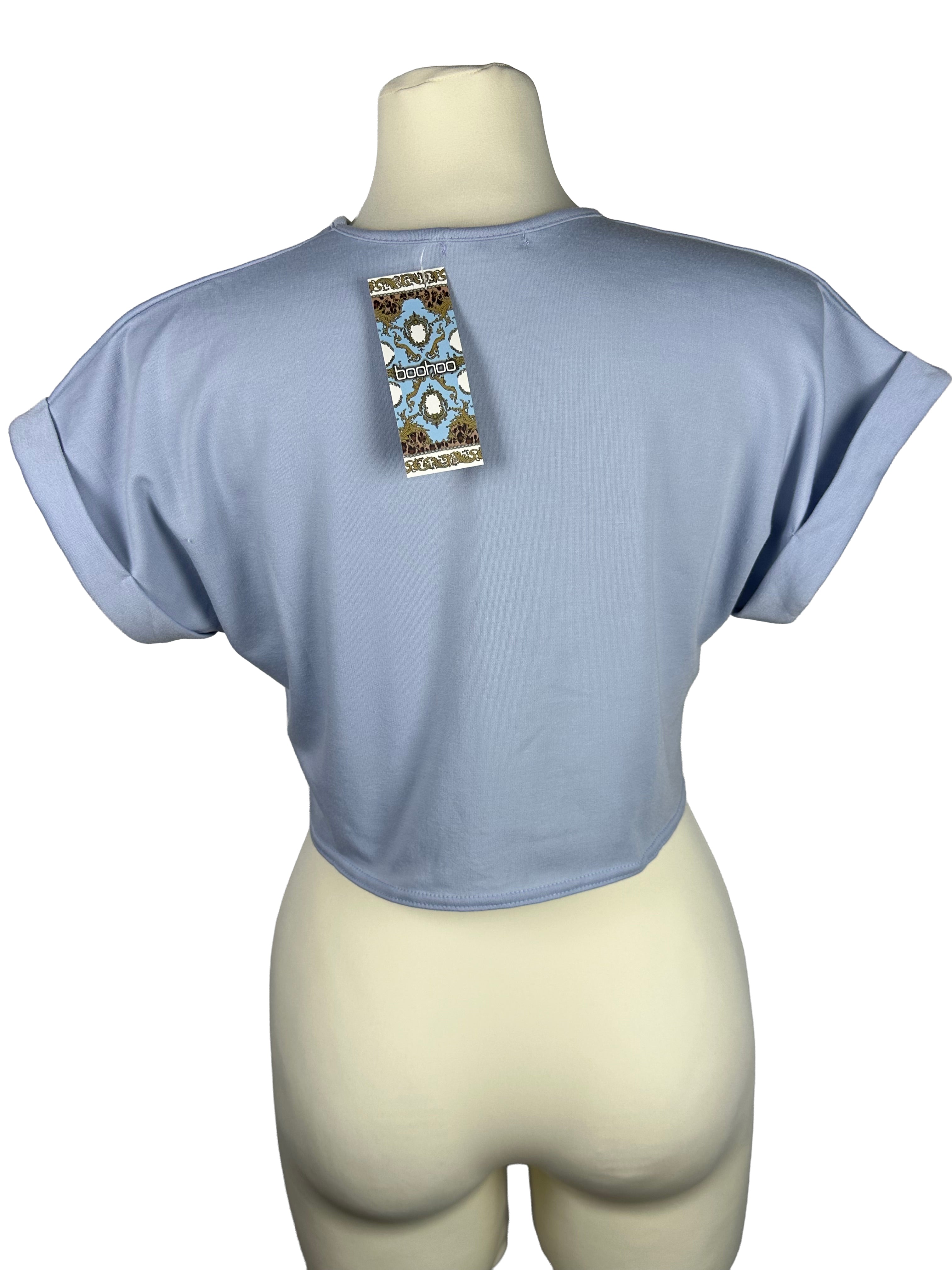 Crop top w kolorze błękitnym od Boohoo